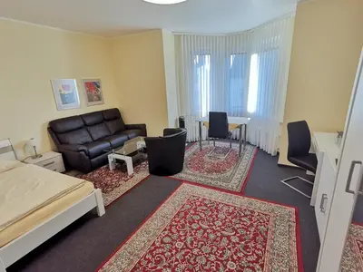 Ein Sitzbereich in der Unterkunft Appartementhaus Regina - Darmstadt - Griesheim