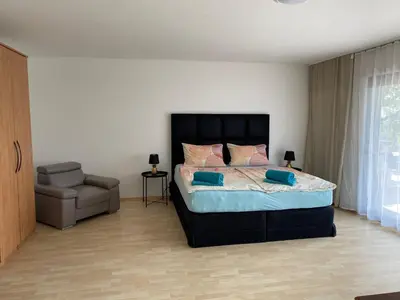 Ein Bett oder Betten in einem Zimmer der Unterkunft am Waldrand