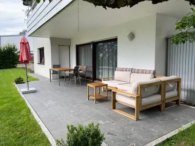 Ein Garten an der Unterkunft am Waldrand