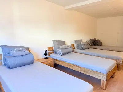Ein Bett oder Betten in einem Zimmer der Unterkunft Boardinghouse Zur Rose
