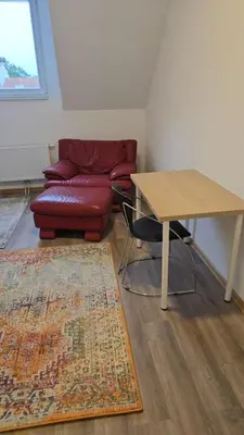 Ein Sitzbereich in der Unterkunft Gästehaus am Marktplatz