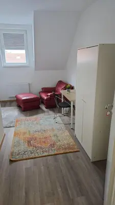 Ein Sitzbereich in der Unterkunft Gästehaus am Marktplatz