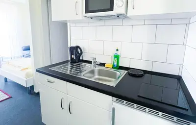 Küche/Küchenzeile in der Unterkunft Appartementhaus Regina - Darmstadt - Griesheim