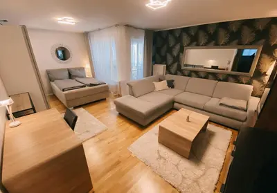 Ein Sitzbereich in der Unterkunft zentrale Design-Ferienwohnung mit Balkon und Stellplatz in Karlsruhe - APOLONIAliving