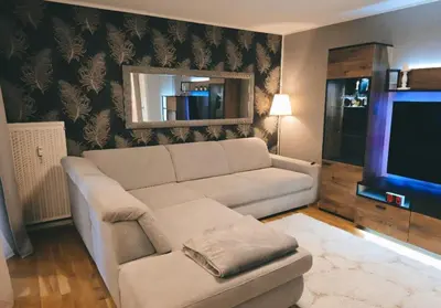 TV/Unterhaltungsangebot in der Unterkunft zentrale Design-Ferienwohnung mit Balkon und Stellplatz in Karlsruhe - APOLONIAliving