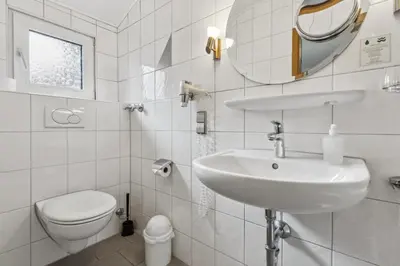 Ein Badezimmer in der Unterkunft Hotel zum Erwin