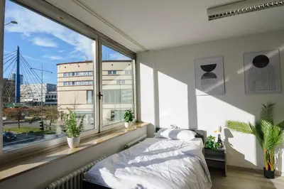 Ein Bett oder Betten in einem Zimmer der Unterkunft MZK Maier Schnäppchen im Zentrum