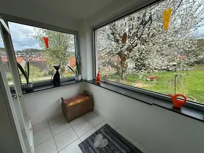 Ein Garten an der Unterkunft Ferienwohnung Am Kirschbaum Mömlingen