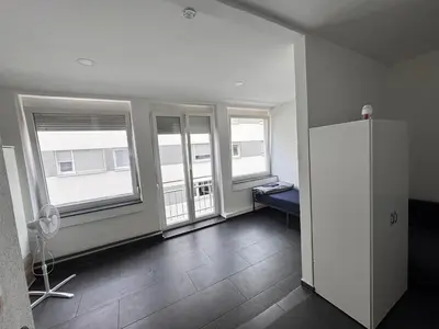 Ein Bett oder Betten in einem Zimmer der Unterkunft Marie Zimmer Zentral Bequem