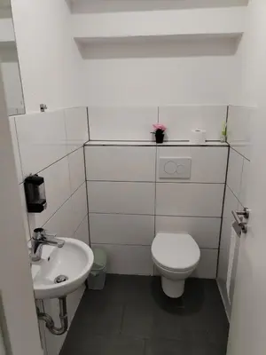 Ein Badezimmer in der Unterkunft Marie Zimmer Zentral Bequem