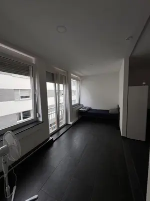 Ein Bett oder Betten in einem Zimmer der Unterkunft Marie Zimmer Zentral Bequem