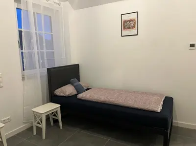 Ein Bett oder Betten in einem Zimmer der Unterkunft Ludwig Camas - Apartments