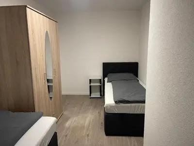 Ein Bett oder Betten in einem Zimmer der Unterkunft Sehr schöne und Modernisierte Wohnung mit moderne Wohnraumlüftung
