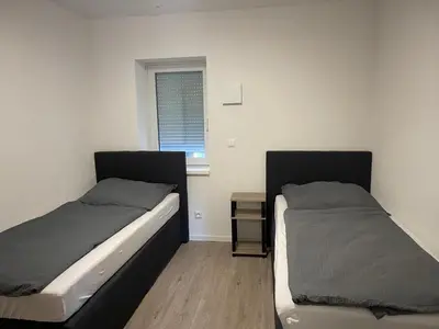 Ein Bett oder Betten in einem Zimmer der Unterkunft Sehr schöne und Modernisierte Wohnung mit moderne Wohnraumlüftung