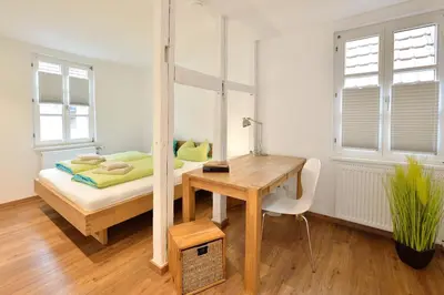 Ein Bett oder Betten in einem Zimmer der Unterkunft Altstadtapartment Himmelreich