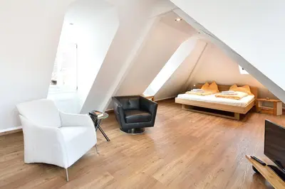 Ein Bett oder Betten in einem Zimmer der Unterkunft Altstadtapartment Himmelreich