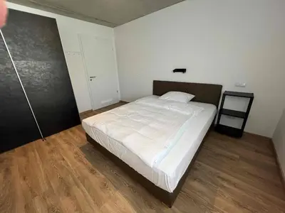 Ein Bett oder Betten in einem Zimmer der Unterkunft City Apartments Centrum
