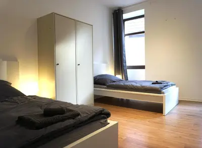 Ein Bett oder Betten in einem Zimmer der Unterkunft 11 Monteursapartments zur Alleinnutzung