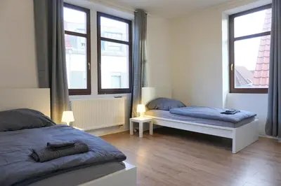 Ein Bett oder Betten in einem Zimmer der Unterkunft 11 Monteursapartments zur Alleinnutzung