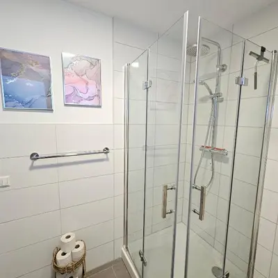 Ein Badezimmer in der Unterkunft Urban Suites HBN