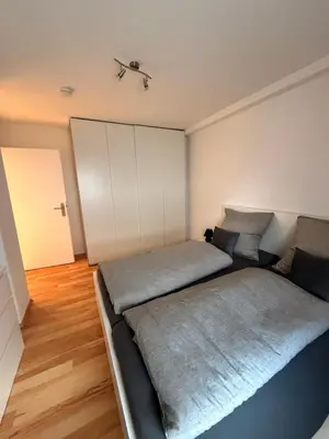 Ein Bett oder Betten in einem Zimmer der Unterkunft Ferienwohnung in den Bergdörfern