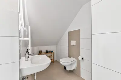 Ein Badezimmer in der Unterkunft Zentral - 4 Schlafzimmer - Küche - Waschmaschine