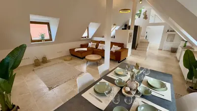 Ein Sitzbereich in der Unterkunft Design Penthouse im Schlossareal Deidesheim
