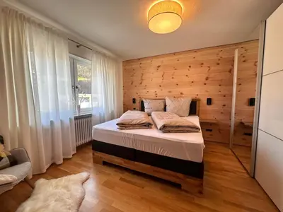 Ein Bett oder Betten in einem Zimmer der Unterkunft Ferienhaus Muskatellerhof