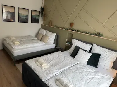 Ein Bett oder Betten in einem Zimmer der Unterkunft Blick auf die Kirche