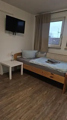 Ein Bett oder Betten in einem Zimmer der Unterkunft Komfortable Monteurwohnung auf Zeit