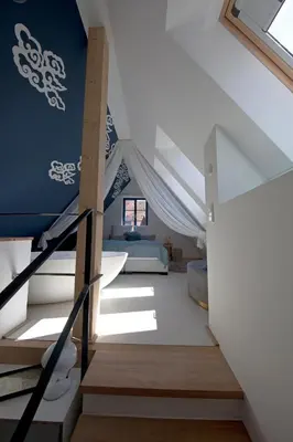 Ein Bett oder Betten in einem Zimmer der Unterkunft die Träumerei GmbH