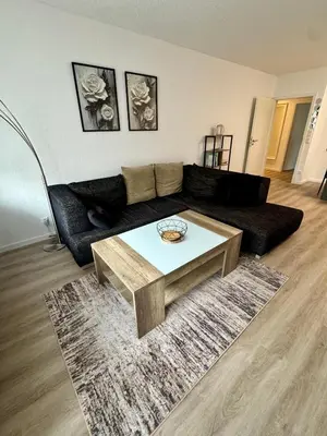 Ein Sitzbereich in der Unterkunft Apartment Rose