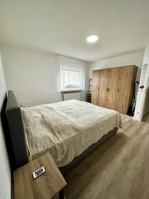 Ein Bett oder Betten in einem Zimmer der Unterkunft Apartment Rose