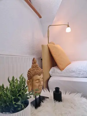 Ein Bett oder Betten in einem Zimmer der Unterkunft Waldquelle Vital Ferienwohnung