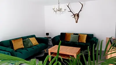 Ein Sitzbereich in der Unterkunft Ferienhaus am Wald