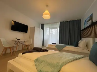 Ein Bett oder Betten in einem Zimmer der Unterkunft modern accomodation