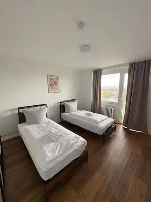 Ein Bett oder Betten in einem Zimmer der Unterkunft Monteurs Wohnung über den Dächern der Stadt