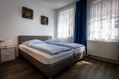 Ein Bett oder Betten in einem Zimmer der Unterkunft Hotel Adler Kornwestheim