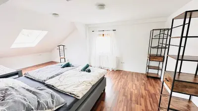Ein Bett oder Betten in einem Zimmer der Unterkunft Stylisches Appartement mit Weitblick