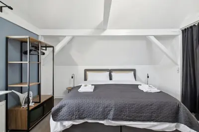 Ein Bett oder Betten in einem Zimmer der Unterkunft Amalfi A10 - 4 Betten - gemütlich und modern