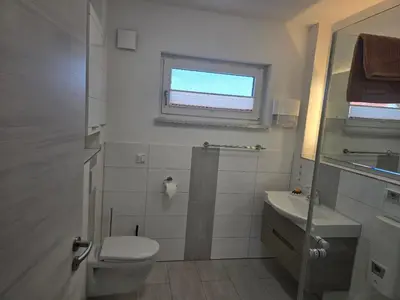 Ein Badezimmer in der Unterkunft Apartment Camelia