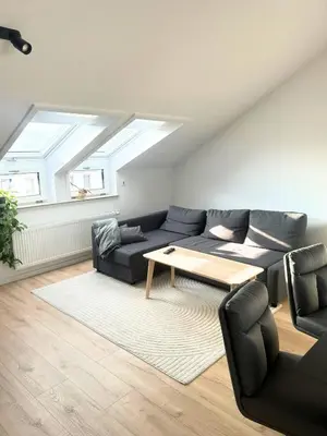 Ein Sitzbereich in der Unterkunft Charming 2-room apartment