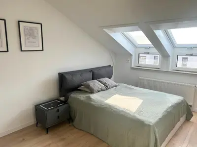 Ein Bett oder Betten in einem Zimmer der Unterkunft Charming 2-room apartment