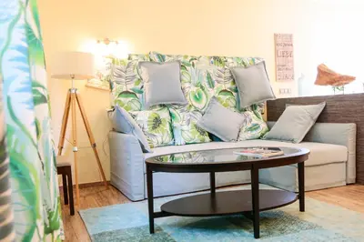 Ein Sitzbereich in der Unterkunft DomPanorama DER KLEINE DSCHUNGEL Apartment für 2-4 Pers