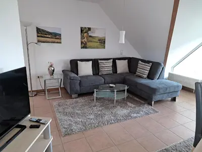 Ein Sitzbereich in der Unterkunft Ferienwohnung Schwab