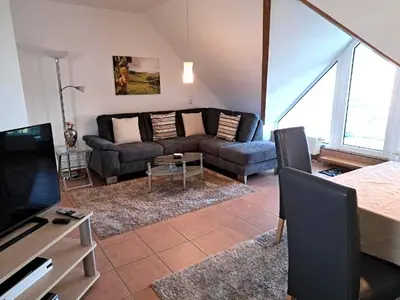 Ein Sitzbereich in der Unterkunft Ferienwohnung Schwab