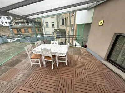 Ein Balkon oder eine Terrasse in der Unterkunft Great apartment downtown with big terrace