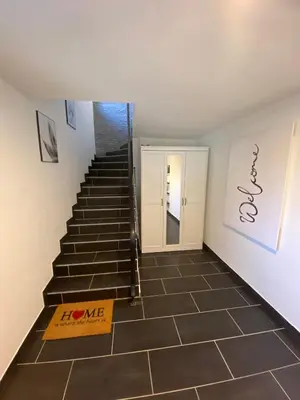 Ein Zertifikat, Auszeichnung, Logo oder anderes Dokument, das in der Unterkunft RIVERSIDE Cozy Apartment an der Weschnitz ausgestellt ist
