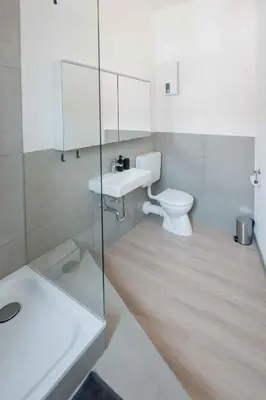 Ein Badezimmer in der Unterkunft FREYZEIT Apartments Speyer