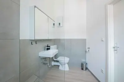 Ein Badezimmer in der Unterkunft FREYZEIT Apartments Speyer